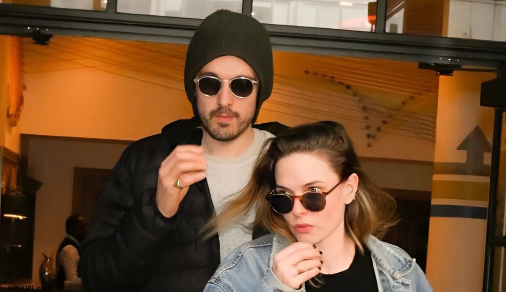 Rory St. Clair Gainer and Rebecca Ferguson are seen exiting a building in casual attire